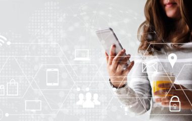 Woman using mobile payments online shopping and icon customer network connection. Digital marketing, m-banking and omni channel.